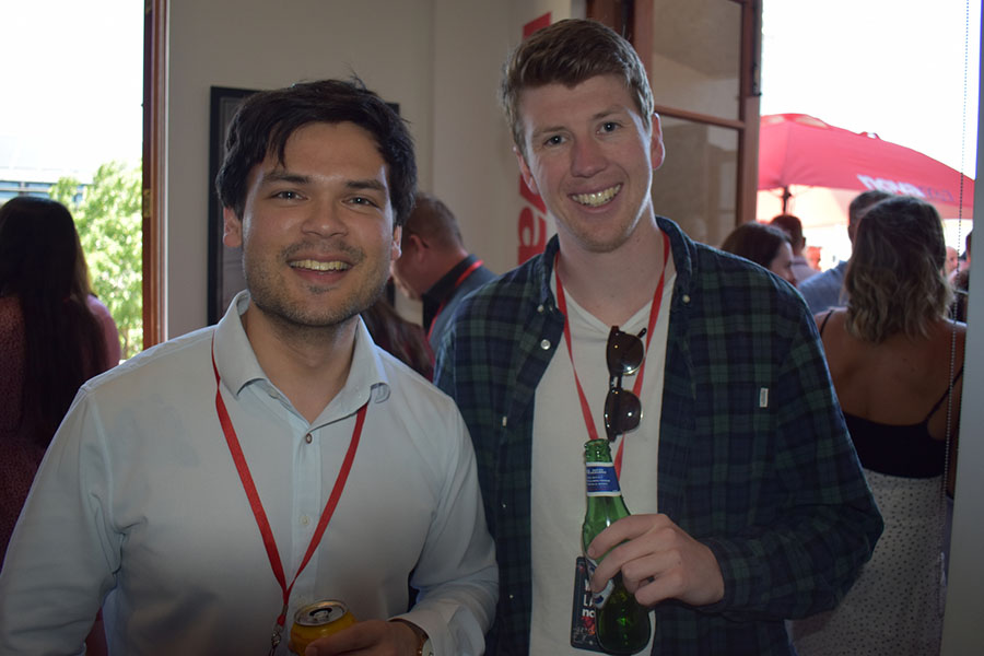 Clients and friends celebrate with Nova 93.7 at their annual Christmas Party on the balcony