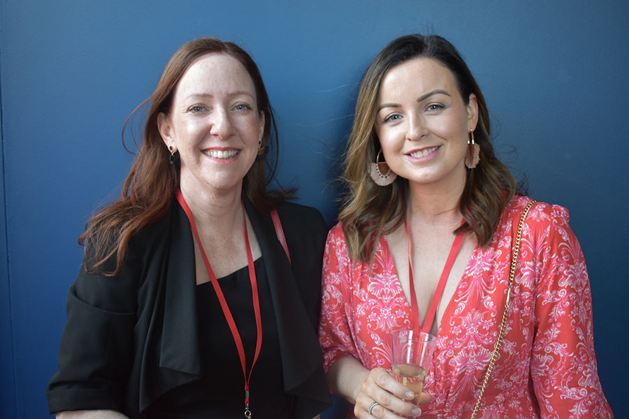 Clients and friends celebrate with Nova 93.7 at their annual Christmas Party on the balcony