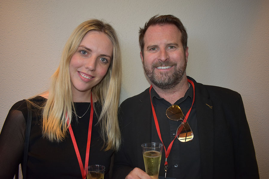 Clients and friends celebrate with Nova 93.7 at their annual Christmas Party on the balcony