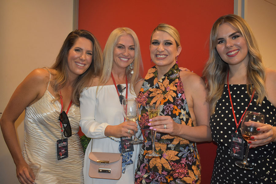 Clients and friends celebrate with Nova 93.7 at their annual Christmas Party on the balcony