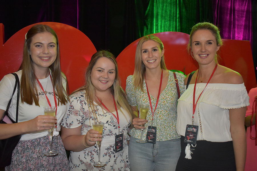 Clients and friends celebrate with Nova 93.7 at their annual Christmas Party on the balcony