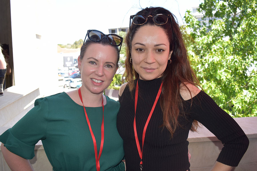 Clients and friends celebrate with Nova 93.7 at their annual Christmas Party on the balcony