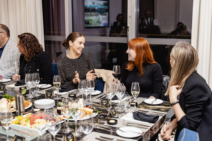 Clients enjoy dinner with the Block’s Scott Cam